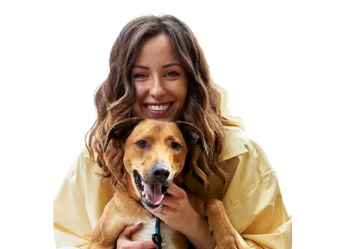 Woman hugging her emotional support dog